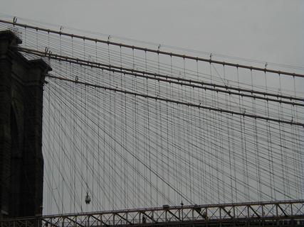Suspension cables on Brooklyn Bridge<br>Location: <a href="https://www.google.com/maps/search/?api=1&query=40.7029,-73.9943" target="_new">Brooklyn City Tour, Old Fulton St</a>